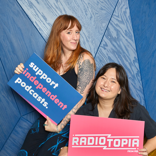 The hosts of Normal Gossip hold up signs expressing support for independent podcasting.